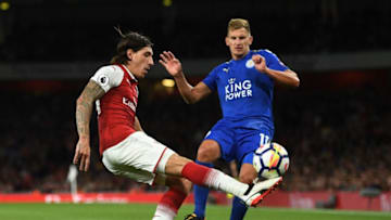 LONDON, ENGLAND - AUGUST 11: Hector Bellerin of Arsenal clears the ball as Marc Albrighton of Leicester City closes in during the Premier League match between Arsenal and Leicester City at the Emirates Stadium on August 11, 2017 in London, England. (Photo by Michael Regan/Getty Images)