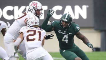 Michigan State Spartans' Jacoby Windmon pursues Minnesota Golden Gophers' Bryce Williams (21) during the second half at Spartan Stadium, Saturday, Sept. 24, 2022.Msu 092422 Kd 3204