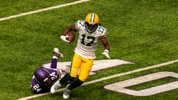 MINNEAPOLIS, MN - SEPTEMBER 13: Davante Adams #17 of the Green Bay Packers runs with the ball after catching a pass in the second quarter of the game against the Minnesota Vikings at U.S. Bank Stadium on September 13, 2020 in Minneapolis, Minnesota. (Photo by Stephen Maturen/Getty Images)