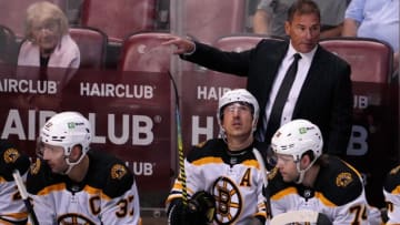 Oct 27, 2021; Sunrise, Florida, USA; Boston Bruins head coach Bruce Cassidy gestures from the bench during the third period against the Florida Panthers at FLA Live Arena. Mandatory Credit: Jasen Vinlove-USA TODAY Sports