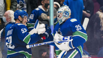 Feb 8, 2022; Vancouver, British Columbia, CAN; Vancouver Canucks forward Bo Horvat (53) and goalie Thatcher Demko (35) celebrate their victory against the Arizona Coyotes at Rogers Arena. Vancouver won 5-1. Mandatory Credit: Bob Frid-USA TODAY Sports