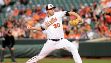 Sep 28, 2015; Baltimore, MD, USA; Baltimore Orioles starting pitcher Chris Tillman (30) pitches during the first inning against the Toronto Blue Jays at Oriole Park at Camden Yards. Mandatory Credit: Tommy Gilligan-USA TODAY Sports