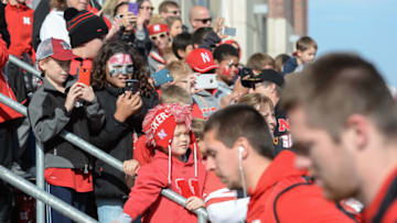 LINCOLN, NE - NOVEMBER 04: Fans of the Nebraska Cornhuskers watch the arrival of the team before the game against the Northwestern Wildcats at Memorial Stadium on November 4, 2017 in Lincoln, Nebraska. (Photo by Steven Branscombe/Getty Images)