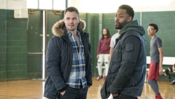 CHICAGO P.D. -- "Anthem" Episode 514 -- Pictured: (l-r) Patrick John Flueger as Adam Ruzek, LaRoyce Hawkins as Kevin Atwater -- (Photo by: Matt Dinerstein/NBC)