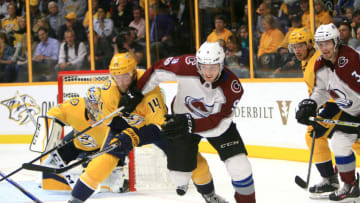NASHVILLE, TN - OCTOBER 17: Nashville Predators defenseman Mattias Ekholm (14) and Colorado Avalanche center Matt Duchene (9) battle for the puck during the NHL game between the Nashville Predators and the Colorado Avalanche, held on October 17, 2017, at Bridgestone Arena in Nashville, Tennessee. (Photo by Danny Murphy/Icon Sportswire via Getty Images)