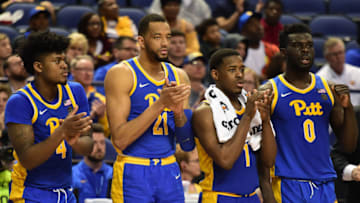 GREENSBORO, NORTH CAROLINA - MARCH 11: Teammates Gerald Drumgoole Jr. #4, Terrell Brown #21, Xavier Johnson #1, and Eric Hamilton #0 of the Pittsburgh Panthers react following a play against the North Carolina State Wolfpack during their game in the second round of the 2020 Men's ACC Basketball Tournament at Greensboro Coliseum on March 11, 2020 in Greensboro, North Carolina. (Photo by Jared C. Tilton/Getty Images)