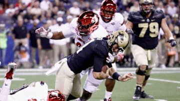 INDIANAPOLIS, IN - SEPTEMBER 02: David Blough #11 of the Purdue Boilermakers is sacked by Trevon Young #91 and G.G. Robinson #94 of the Louisville Cardinals at Lucas Oil Stadium on September 2, 2017 in Indianapolis, Indiana. (Photo by Andy Lyons/Getty Images)