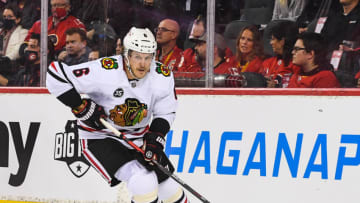 CALGARY, AB - NOVEMBER 23: Jake McCabe #6 of the Chicago Blackhawks in action against the Calgary Flames during an NHL game at Scotiabank Saddledome on November 23, 2021 in Calgary, Alberta, Canada. (Photo by Derek Leung/Getty Images)