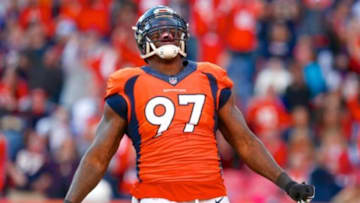 Dec 7, 2014; Denver, CO, USA; Denver Broncos defensive end Malik Jackson (97) reacts after making a sack in the second quarter against the Buffalo Bills at Sports Authority Field at Mile High. Mandatory Credit: Isaiah J. Downing-USA TODAY Sports