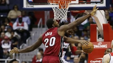 Jan 15, 2014; Washington, DC, USA; Miami Heat center Greg Oden (20) defends a pass by Washington Wizards power forward Nene (42) in the third quarter at Verizon Center. The Wizards won 114-97. Mandatory Credit: Geoff Burke-USA TODAY Sports