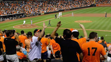 Aug 18, 2016; Baltimore, MD, USA; Baseball fans cheer after the Baltimore Orioles score during the fourth inning against the Houston Astros at Oriole Park at Camden Yards. Mandatory Credit: Tommy Gilligan-USA TODAY Sports