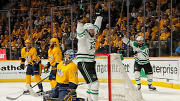 NASHVILLE, TENNESSEE - APRIL 20: Alexander Radulov #47 of the Dallas Stars celebrates with teammate Jamie Benn #14 after scoring a goal against goalie Pekka Rinne #35 of the Nashville Predators during the second period of Game Five of the Western Conference First Round during the 2019 NHL Stanley Cup Playoffs at Bridgestone Arena on April 20, 2019 in Nashville, Tennessee. (Photo by Frederick Breedon/Getty Images)