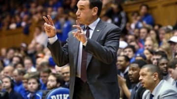 Nov 14, 2015; Durham, NC, USA; Duke Blue Devils head coach Mike Krzyzewski signals to his players in their game against the Bryant University Bulldogs at Cameron Indoor Stadium. Mandatory Credit: Mark Dolejs-USA TODAY Sports