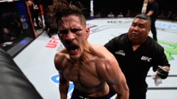 HOUSTON, TX - FEBRUARY 04: (R-L) Niko Price celebrates his knockout victory over Alex Morono in their welterweight bout during the UFC Fight Night event at the Toyota Center on February 4, 2017 in Houston, Texas. (Photo by Jeff Bottari/Zuffa LLC/Zuffa LLC via Getty Images)