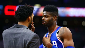 Dec 26, 2015; Phoenix, AZ, USA; Philadelphia 76ers forward Nerlens Noel (right) talks with center Jahlil Okafor against the Phoenix Suns at Talking Stick Resort Arena. Mandatory Credit: Mark J. Rebilas-USA TODAY Sports