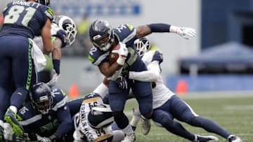 SEATTLE, WA - OCTOBER 07: Running Back Chris Carson #32 of the Seattle Seahawks runs the ball during the second half against the Los Angeles Rams at CenturyLink Field on October 7, 2018 in Seattle, Washington. (Photo by Stephen Brashear/Getty Images)