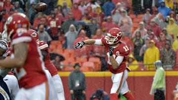 Dec 13, 2015; Kansas City, MO, USA; Kansas City Chiefs quarterback Alex Smith (11) throws a pass during the first half against the San Diego Chargers at Arrowhead Stadium. Mandatory Credit: Denny Medley-USA TODAY Sports