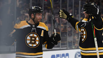 BOSTON, MA - OCTOBER 13: Patrice Bergeron #37 of the Boston Bruins celebrates a goal against the New Jersey Devils at the TD Garden on October 13, 2019 in Boston, Massachusetts. (Photo by Steve Babineau/NHLI via Getty Images)