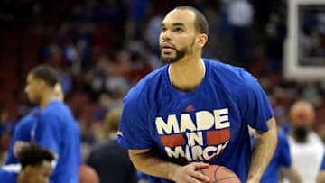 Mar 26, 2016; Louisville, KY, USA; Kansas Jayhawks forward Perry Ellis (34) warms up before the game against the Villanova Wildcats in the south regional final of the NCAA Tournament at KFC YUM!. Mandatory Credit: Jamie Rhodes-USA TODAY Sports