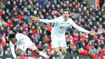 LIVERPOOL, ENGLAND - JANUARY 21: Fernando Llorente of Swansea City celebrates scoring his sides second goal of the match during the Premier League match between Liverpool and Swansea City at Anfield on January 21, 2017 in Liverpool, England. (Photo by Athena Pictures/Getty Images)