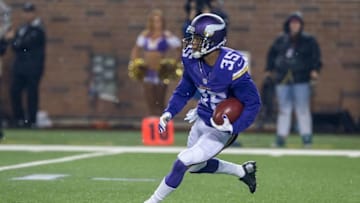 Aug 22, 2015; Minneapolis, MN, USA; Minnesota Vikings cornerback Marcus Sherels (35) returns a punt by the Oakland Raiders in the third quarter at TCF Bank Stadium. The Vikings win 20-12. Mandatory Credit: Bruce Kluckhohn-USA TODAY Sports