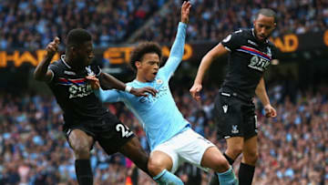 MANCHESTER, ENGLAND - SEPTEMBER 23: Leroy Sane (C) of Manchester City is chellenged by Timothy Fosu-Mensah (L) and Andros Townsend (R) of Crystal Palace during the Premier League match between Manchester City and Crystal Palace at Etihad Stadium on September 23, 2017 in Manchester, England. (Photo by Alex Livesey/Getty Images)