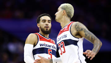 PHILADELPHIA, PENNSYLVANIA - NOVEMBER 06: Tyus Jones #5 and Kyle Kuzma #33 of the Washington Wizards react during the third quarter against the Philadelphia 76ers at the Wells Fargo Center on November 06, 2023 in Philadelphia, Pennsylvania. NOTE TO USER: User expressly acknowledges and agrees that, by downloading and or using this photograph, User is consenting to the terms and conditions of the Getty Images License Agreement. (Photo by Tim Nwachukwu/Getty Images)