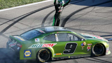 KANSAS CITY, KS - OCTOBER 21: Chase Elliott, driver of the #9 Mountain Dew Chevrolet, celebrates after winning the Monster Energy NASCAR Cup Series Hollywood Casino 400 at Kansas Speedway on October 21, 2018 in Kansas City, Kansas. (Photo by Jonathan Ferrey/Getty Images)