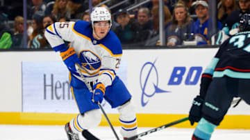 Oct 25, 2022; Seattle, Washington, USA; Buffalo Sabres defenseman Owen Power (25) skates with the puck against the Seattle Kraken during the second period at Climate Pledge Arena. Mandatory Credit: Joe Nicholson-USA TODAY Sports