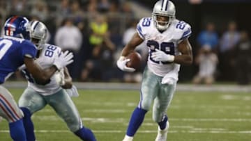 Oct 19, 2014; Arlington, TX, USA; Dallas Cowboys running back DeMarco Murray (29) runs with the ball in the fourth quarter against the New York Giants at AT&T Stadium. The Cowboys beat the Giants 31-21.Murray broke the NFL record with 7+ consecutive games with 100+ yards. Mandatory Credit: Matthew Emmons-USA TODAY Sports