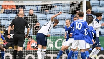 Tottenham Hotspur's English striker Harry Kane (C) scores their first goal to equalise 1-1 during the English Premier League football match between Leicester City and Tottenham Hotspur at King Power Stadium in Leicester, central England on May 23, 2021. - RESTRICTED TO EDITORIAL USE. No use with unauthorized audio, video, data, fixture lists, club/league logos or 'live' services. Online in-match use limited to 120 images. An additional 40 images may be used in extra time. No video emulation. Social media in-match use limited to 120 images. An additional 40 images may be used in extra time. No use in betting publications, games or single club/league/player publications. (Photo by Shaun Botterill / POOL / AFP) / RESTRICTED TO EDITORIAL USE. No use with unauthorized audio, video, data, fixture lists, club/league logos or 'live' services. Online in-match use limited to 120 images. An additional 40 images may be used in extra time. No video emulation. Social media in-match use limited to 120 images. An additional 40 images may be used in extra time. No use in betting publications, games or single club/league/player publications. / RESTRICTED TO EDITORIAL USE. No use with unauthorized audio, video, data, fixture lists, club/league logos or 'live' services. Online in-match use limited to 120 images. An additional 40 images may be used in extra time. No video emulation. Social media in-match use limited to 120 images. An additional 40 images may be used in extra time. No use in betting publications, games or single club/league/player publications. (Photo by SHAUN BOTTERILL/POOL/AFP via Getty Images)