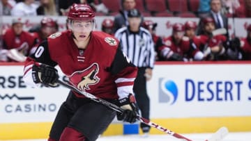 Oct 2, 2015; Glendale, AZ, USA; Arizona Coyotes center Dylan Strome (20) watches the puck during the second period against the San Jose Sharks at Gila River Arena. Mandatory Credit: Matt Kartozian-USA TODAY Sports