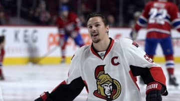 Nov 3, 2015; Montreal, Quebec, CAN; Ottawa Senators defenseman Erik Karlsson (65) stretches during the warmup period before the game against the Montreal Canadiens at the Bell Centre. Mandatory Credit: Eric Bolte-USA TODAY Sports