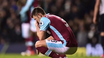 LONDON, ENGLAND - NOVEMBER 19: Aaron Cresswell of West Ham United is dejected after the final whistle during the Premier League match between Tottenham Hotspur and West Ham United at White Hart Lane on November 19, 2016 in London, England. (Photo by Alex Broadway/Getty Images)