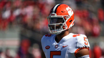 Sep 25, 2021; Raleigh, North Carolina, USA; Clemson Tigers quarterback DJ Uiagalelei (5) warms up prior to a game against the North Carolina State Wolfpack at Carter-Finley Stadium. Mandatory Credit: Rob Kinnan-USA TODAY Sports