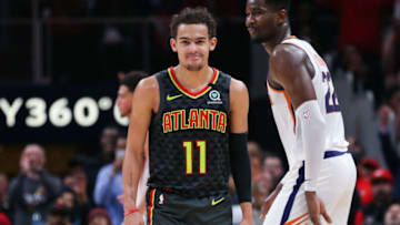 ATLANTA, GA - JANUARY 14: Trae Young #11 of the Atlanta Hawks reacts following a three-point basket during the fourth quarter of a game against the Phoenix Suns at State Farm Arena on January 14, 2020 in Atlanta, Georgia. NOTE TO USER: User expressly acknowledges and agrees that, by downloading and or using this photograph, User is consenting to the terms and conditions of the Getty Images License Agreement. (Photo by Carmen Mandato/Getty Images)