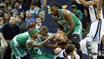 Dec 20, 2016; Memphis, TN, USA; Boston Celtics guard Isaiah Thomas (4) forward Al Horford (42) and forward Jae Crowder (99) reach for loose ball as Memphis Grizzlies center Marc Gasol (33) holds on in the second quarter at FedExForum. Mandatory Credit: Nelson Chenault-USA TODAY Sports