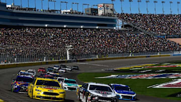 LAS VEGAS, NV - MARCH 04: Kevin Harvick, driver of the #4 Jimmy John's Ford, and Joey Logano, driver of the #22 Pennzoil Ford, lead the field during the Monster Energy NASCAR Cup Series Pennzoil 400 presented by Jiffy Lube at Las Vegas Motor Speedway on March 4, 2018 in Las Vegas, Nevada. (Photo by Robert Laberge/Getty Images)