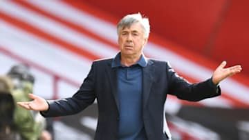 Everton's Italian head coach Carlo Ancelotti reacts during the English Premier League football match between Sheffield United and Everton at Bramall Lane stadium in Sheffield, northern England, on July 20, 2020. (Photo by PETER POWELL / various sources / AFP) / RESTRICTED TO EDITORIAL USE. No use with unauthorized audio, video, data, fixture lists, club/league logos or 'live' services. Online in-match use limited to 120 images. An additional 40 images may be used in extra time. No video emulation. Social media in-match use limited to 120 images. An additional 40 images may be used in extra time. No use in betting publications, games or single club/league/player publications. / (Photo by PETER POWELL/AFP via Getty Images)