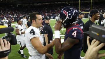 Oct 27, 2019; Houston, TX, USA; Houston Texans quarterback Deshaun Watson (4) and Oakland Raiders quarterback Derek Carr (4) shake hands after the game at NRG Stadium. Mandatory Credit: Kevin Jairaj-USA TODAY Sports
