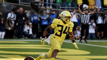 EUGENE, OR - OCTOBER 13: Running back CJ Verdell #34 of the Oregon Ducks scores the winning touchdown in overtime of the game against the Washington Huskies at Autzen Stadium on October 13, 2018 in Eugene, Oregon. The Ducks won the game 30-27. (Photo by Steve Dykes/Getty Images)