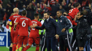 TORONTO, ON - NOVEMBER 30: Players of Toronto FC celebrate a goal by Jozy Altidore #17 as Head Coach Greg Vanney applauds during the first half of the MLS Eastern Conference Final, Leg 2 game against Montreal Impact at BMO Field on November 30, 2016 in Toronto, Ontario, Canada. (Photo by Vaughn Ridley/Getty Images)