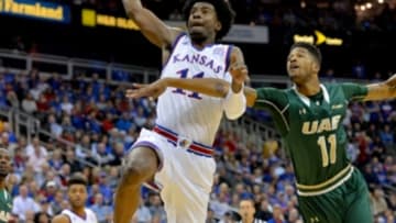 Nov 21, 2016; Kansas City, MO, USA; Kansas Jayhawks guard Josh Jackson (11) dunks the ball as UAB Blazers guard Dirk Williams (11) defends during the first half at Sprint Center. Mandatory Credit: Denny Medley-USA TODAY Sports