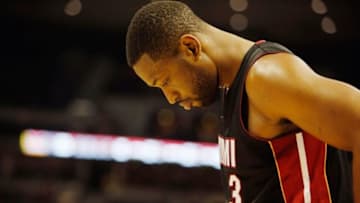 Dec 10, 2014; Denver, CO, USA; Miami Heat guard Dwyane Wade (3) reacts during the second half against the Denver Nuggets at Pepsi Center. Mandatory Credit: Chris Humphreys-USA TODAY Sports