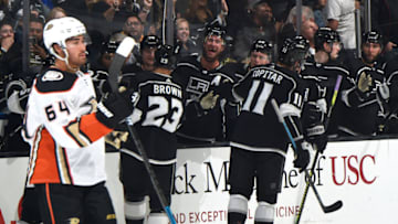 LOS ANGELES, CA - SEPTEMBER 23: Dustin Brown #23 of the Los Angeles Kings and Anze Kopitar #11 celebrate Dustin Brown's third-period goal with teammates during the third period of the preseason game against the Anaheim Ducks at STAPLES Center on September 23, 2019 in Los Angeles, California. (Photo by Adam Pantozzi/NHLI via Getty Images)