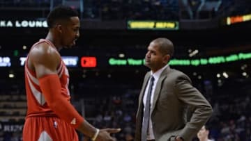 Feb 4, 2016; Phoenix, AZ, USA; Houston Rockets center Dwight Howard (12) talks with head coach J.B. Bickerstaff at Talking Stick Resort Arena. Mandatory Credit: Jennifer Stewart-USA TODAY Sports