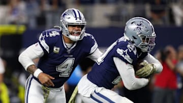 ARLINGTON, TEXAS - NOVEMBER 10: Dak Prescott #4 of the Dallas Cowboys hands off to Ezekiel Elliott #21 of the Dallas Cowboys in the fourth quarter against the Minnesota Vikings at AT&T Stadium on November 10, 2019 in Arlington, Texas. (Photo by Richard Rodriguez/Getty Images)