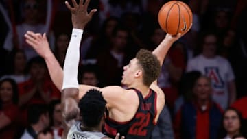 TUCSON, AZ - MARCH 01: Reid Travis #22 of the Stanford Cardinal shoots against Deandre Ayton #13 of the Arizona Wildcats during the college basketball game at McKale Center on March 1, 2018 in Tucson, Arizona. The Wildcats beat the Cardinal 75-67. (Photo by Chris Coduto/Getty Images)