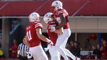 LINCOLN, NE - OCTOBER 27: Wide receiver Stanley Morgan Jr. #8 of the Nebraska Cornhuskers celebrates with tight end Kurt Rafdal #82 and tight end Austin Allen #11 after scoring against the Bethune Cookman Wildcats in the first half at Memorial Stadium on October 27, 2018 in Lincoln, Nebraska. (Photo by Steven Branscombe/Getty Images)