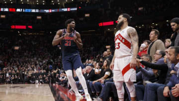 Fred VanVleet #23 of the Toronto Raptors looks on as Joel Embiid #21 of the Philadelphia 76ers celebrates a three-pointer in the final seconds of overtime in Game Three of the Eastern Conference First Round against the Toronto Raptors. (Photo by Cole Burston/Getty Images)